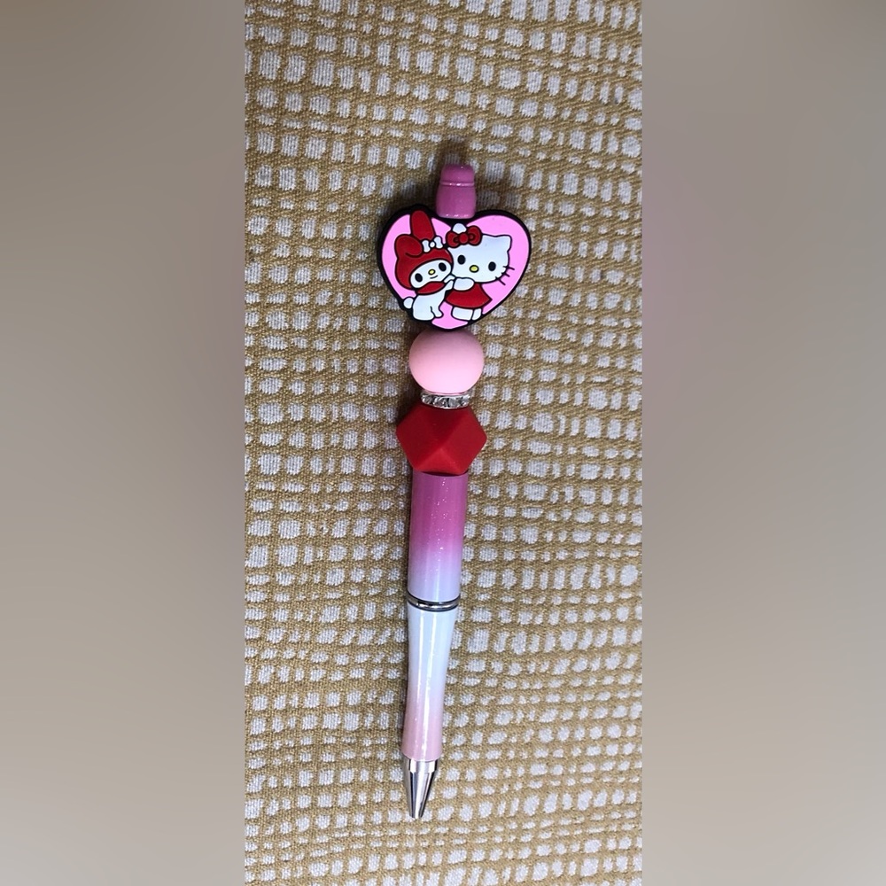 Hello Kitty beads pen pink purple. 6” LX 1” W